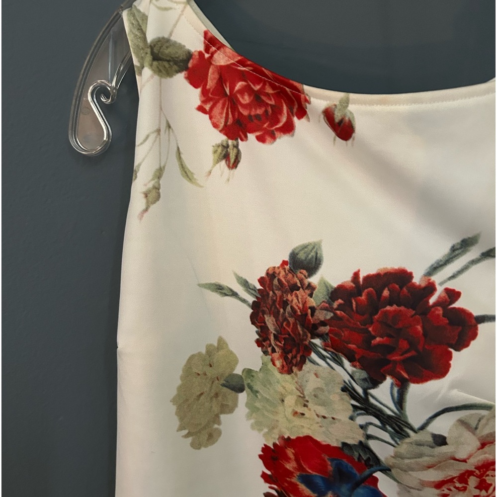 Very pretty one sleeve AX floral dress. Above knee. Size 10; fits like an 8.